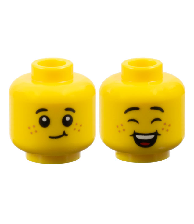 LEGO - Minifiguur-hoofd dubbelzijdig kind, kleine zwarte wenkbrauwen, nougat sproeten, scheve grijns met kuiltje / gesloten ogen, open glimlach met kuiltjes, boventanden en rode tong - geventileerde nop - Yellow | N